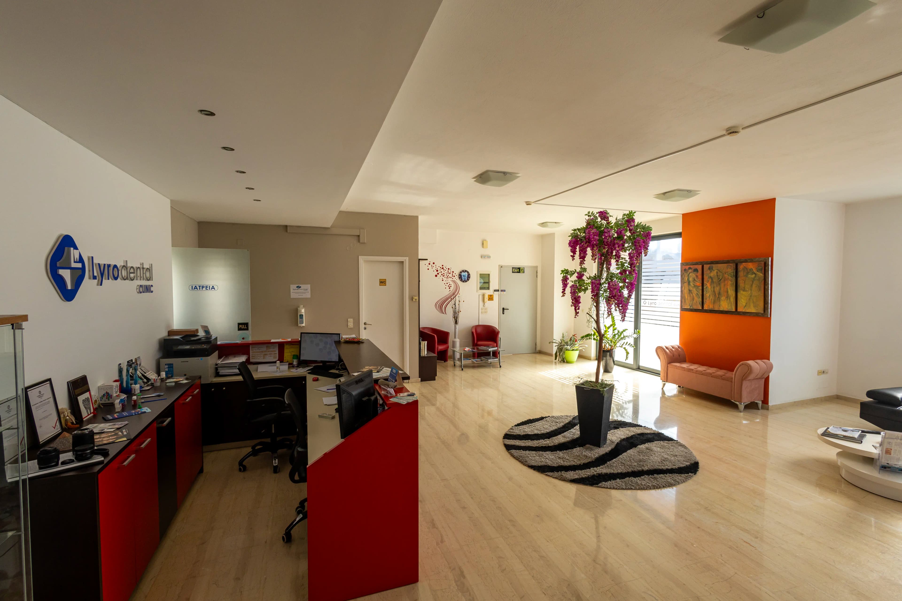 The spacious reception and waiting area at LyroDental